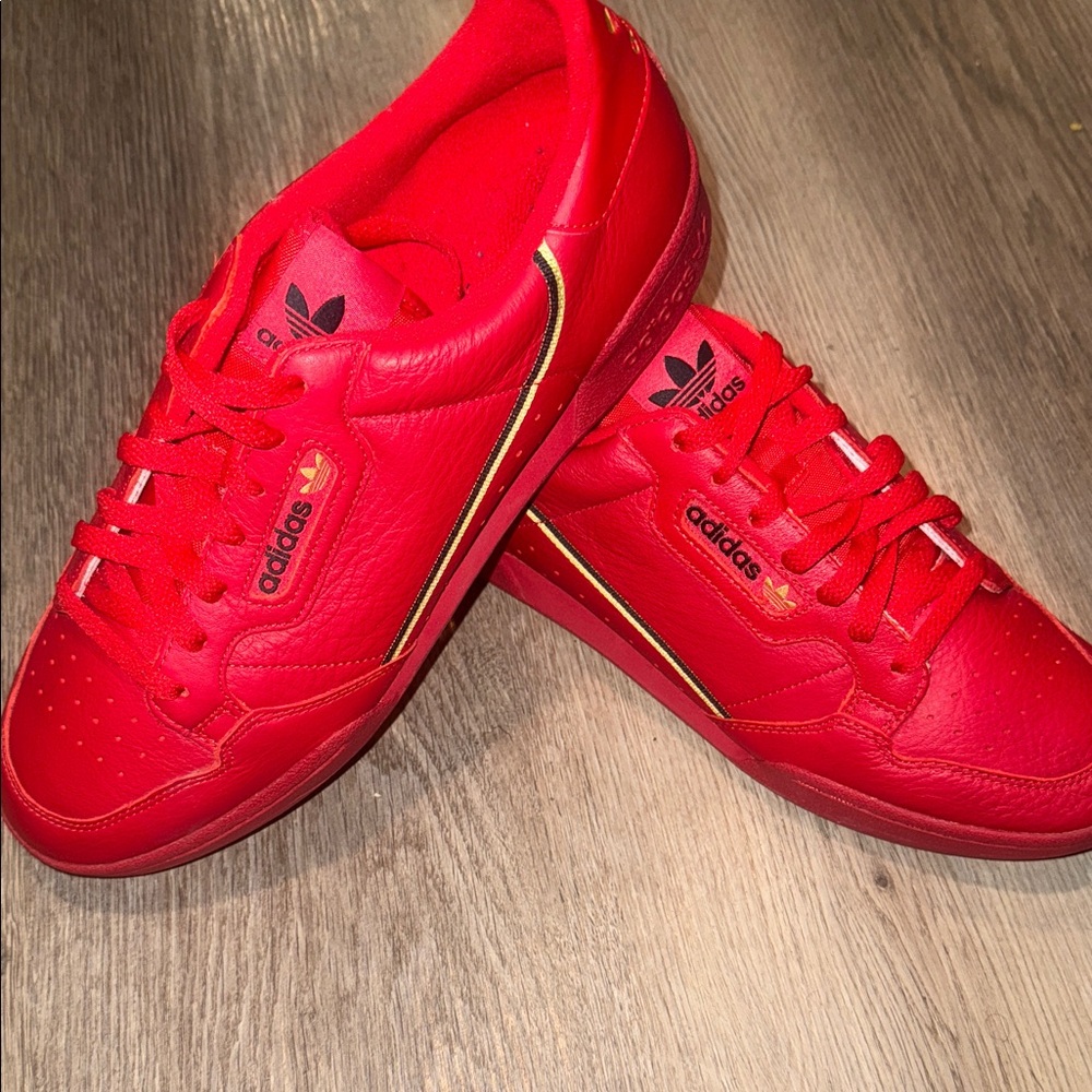 Adidas Men's Bold Red Sneakers with Gold Accents